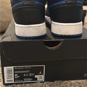Air Jordan 1 Mid GS Black and Blue Sneakers